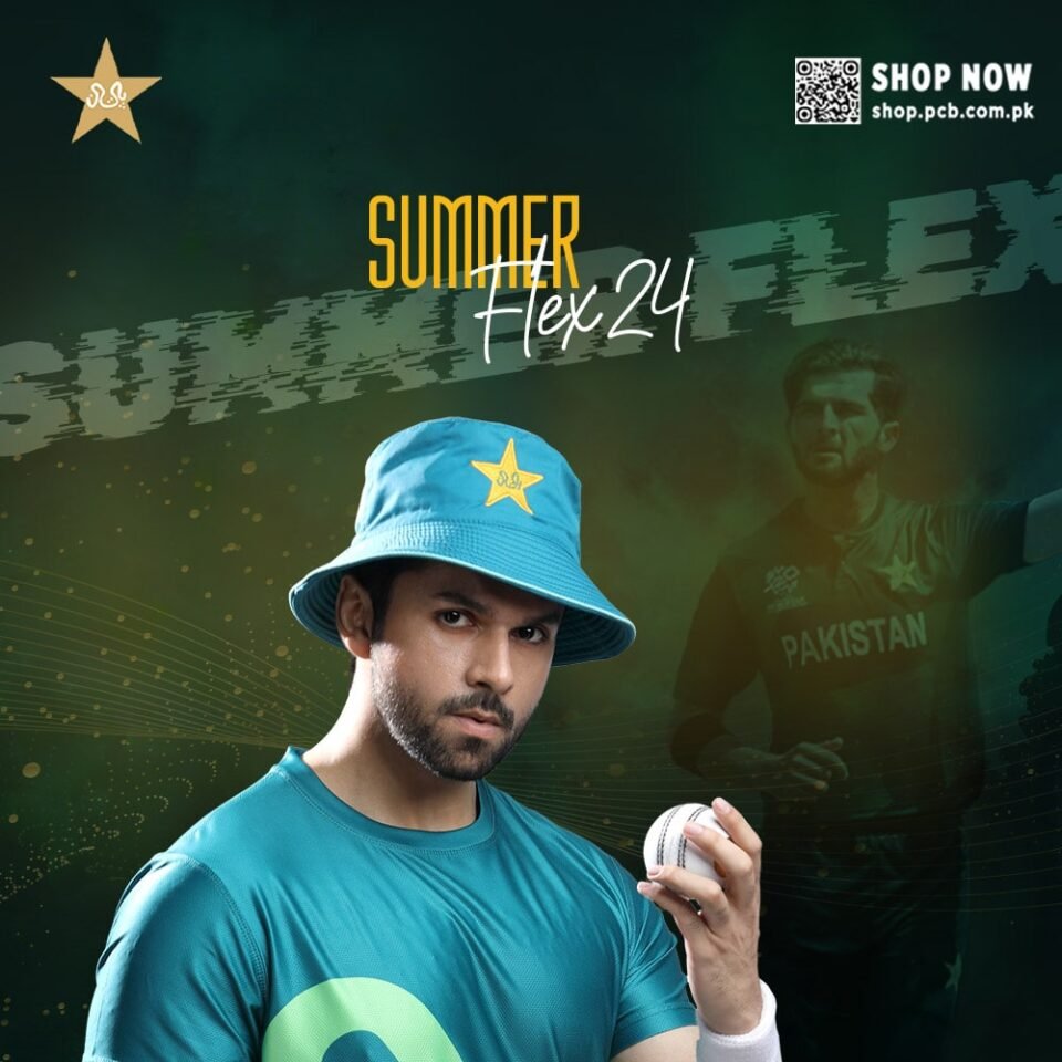 A vibrant teal and lime green, short-sleeved sportswear shirt and matching shorts, featuring a large, stylized, abstract graphic. The athletic set is modeled by a smiling South Asian man with dark hair and a beard, who is pointing enthusiastically with both hands to the sides. He is wearing a white wristband. The background is a moody, dark green and black with abstract graphics, and promotional text that says "SUMMER FLEX 24" and "SHOP NOW https://www.google.com/search?q=shop.pcb.com.pk". Editorial fashion photography by AHSANZ.